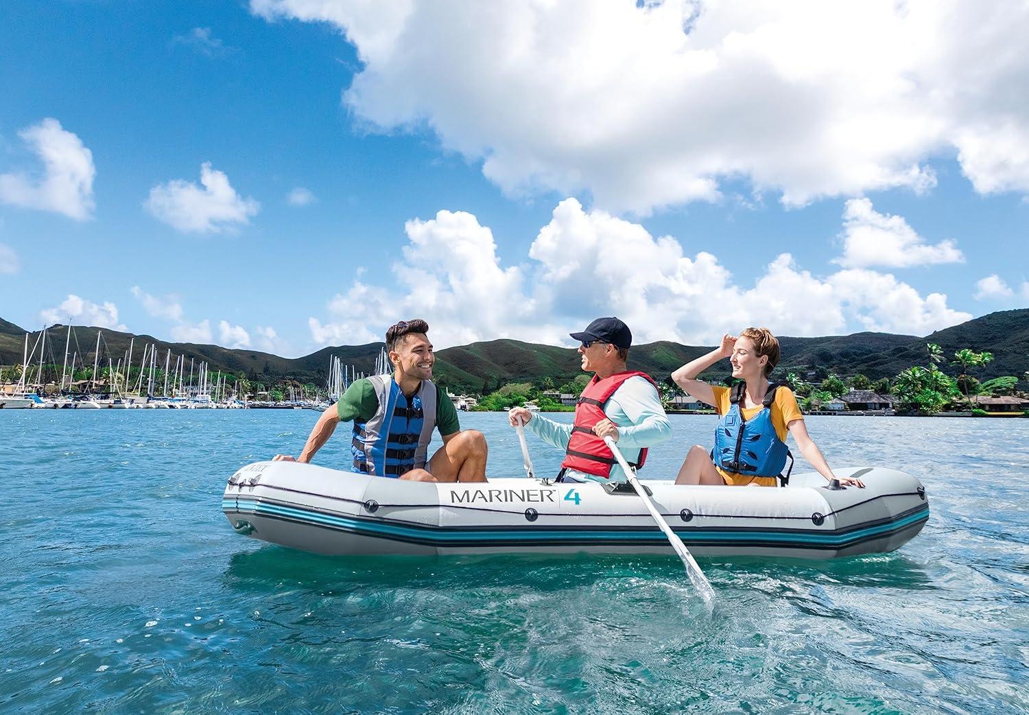 imageINTEX 68376EP Mariner 4 Inflatable Boat Set Includes Deluxe 54in Boat Oars and HighOutput Pump WearResistant Keel Removable Fishing Rod Holders 4Person 1100lb Weight Capacity
