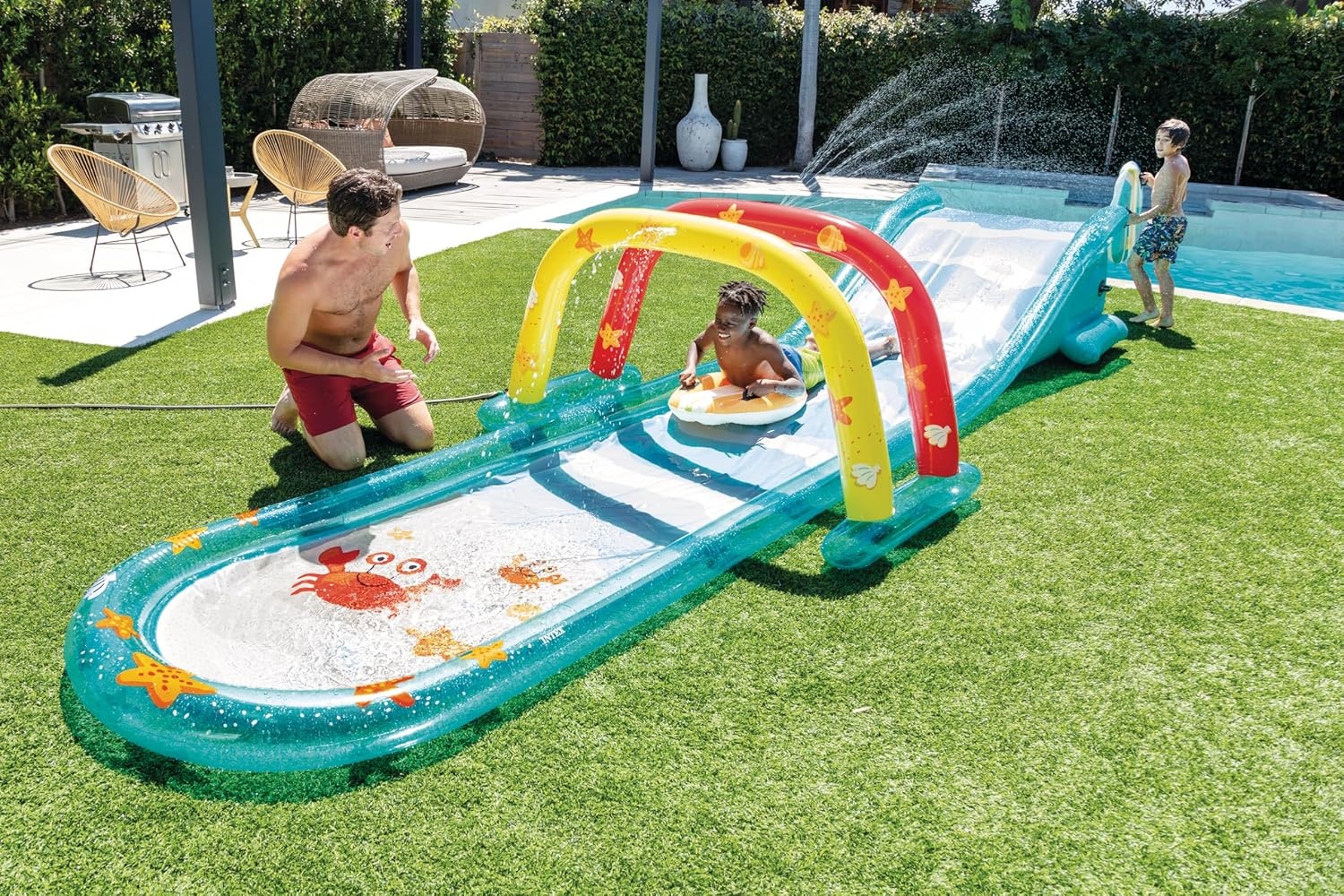 image:imageIntex 57167EP 185 Foot Long Inflatable Racing Fun Water Slide Track with 2 Surf Car Riders and Builtin Sprayer for Ages 6 and UpBlue